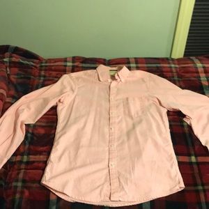 Salmon colored button down shirt. Slim fit.